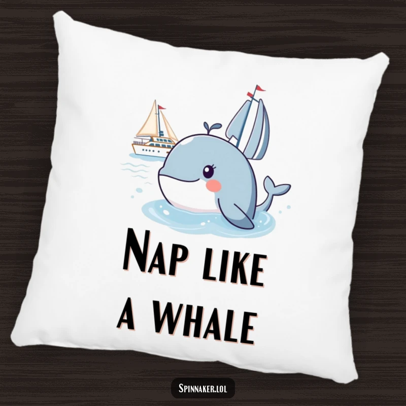 Funny whale pillow with a curious whale peeking at a yacht, providing humorous comfort and marine-themed decor.