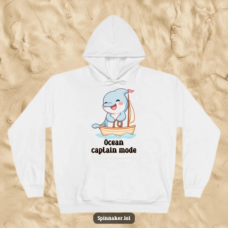 Funny grinning dolphin steering a small sailboat with fluffy paws on a hoodie.