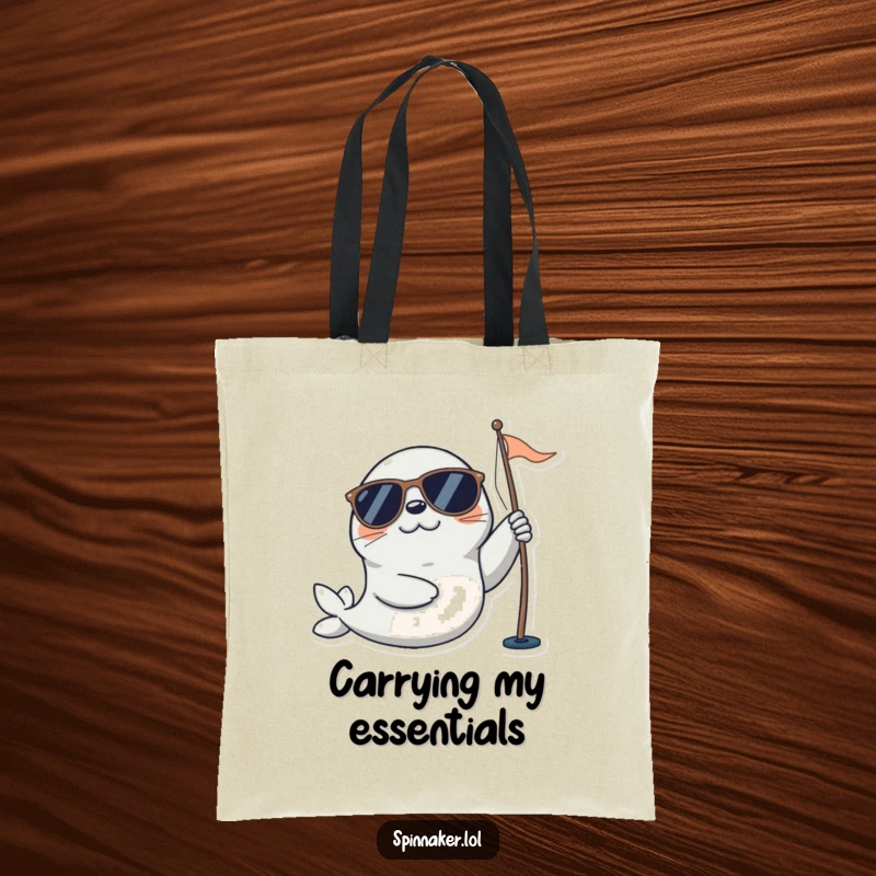 Funny seal tote bag with a playful character in sunglasses happily adjusting a sail, ideal for beach outings and nautical enthusiasts.